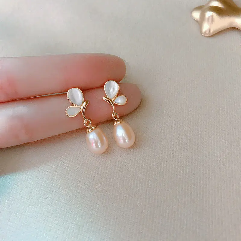 

New Fashion Simulation Pearl Drop Earrings Female Angel Wing Gold Wedding Stud Earrings Fashion Korean Jewelry Pendant Earrings