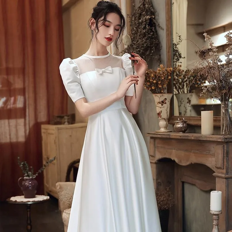 

White Satin Elegant Formal Party Dress Female Sweet Sweet Bow Trim Long A-Line Dresses Hollow Out Exquisite Slim Banquet Gown