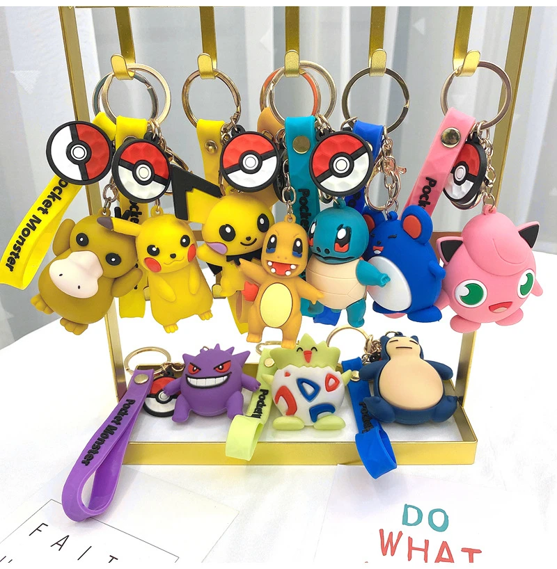 

Anime Pokemon Figure Kawaii Pikachu Squirtle Charmander Psyduck Key Buckle Collectible Model Decorations Doll Toys for Children