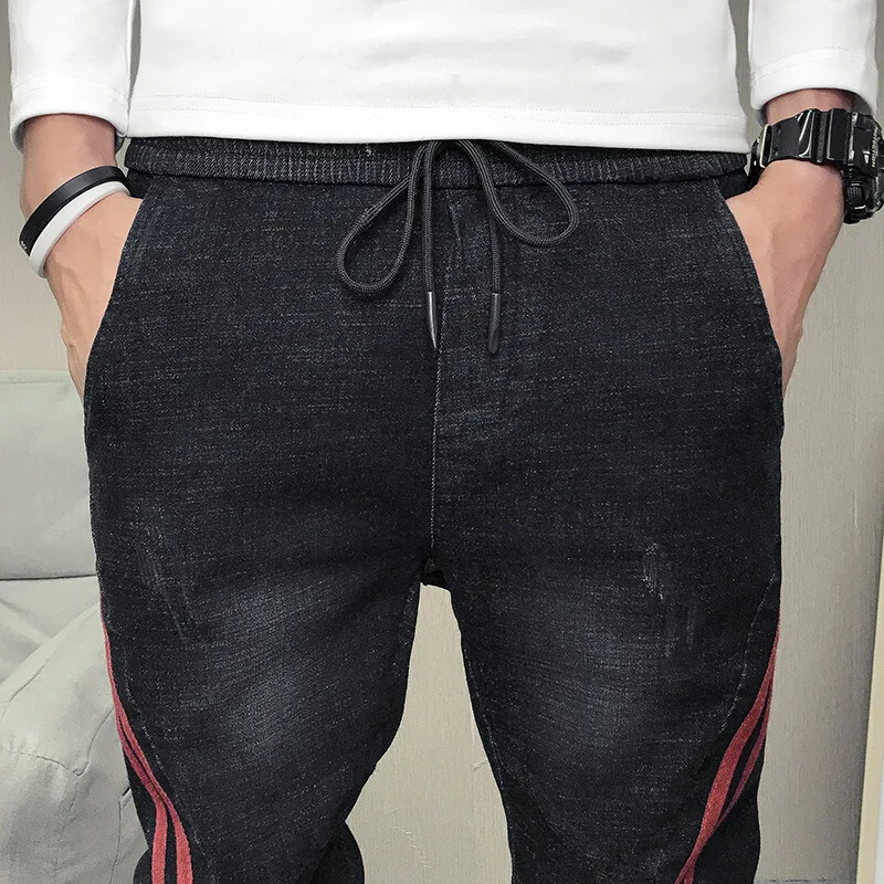 

Wholesale 2021 Spring autumn social guys beamed denim skinny jeans streetwear casual pants male Korean stretch trousers boys