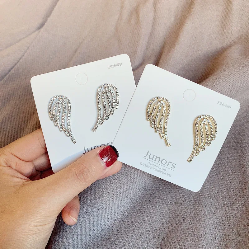 

Valentine's Day present Boucle oreille femme 2021 New Temperament Fashion Angel Rhinestone Small Wings Earrings Korea Wild Earri