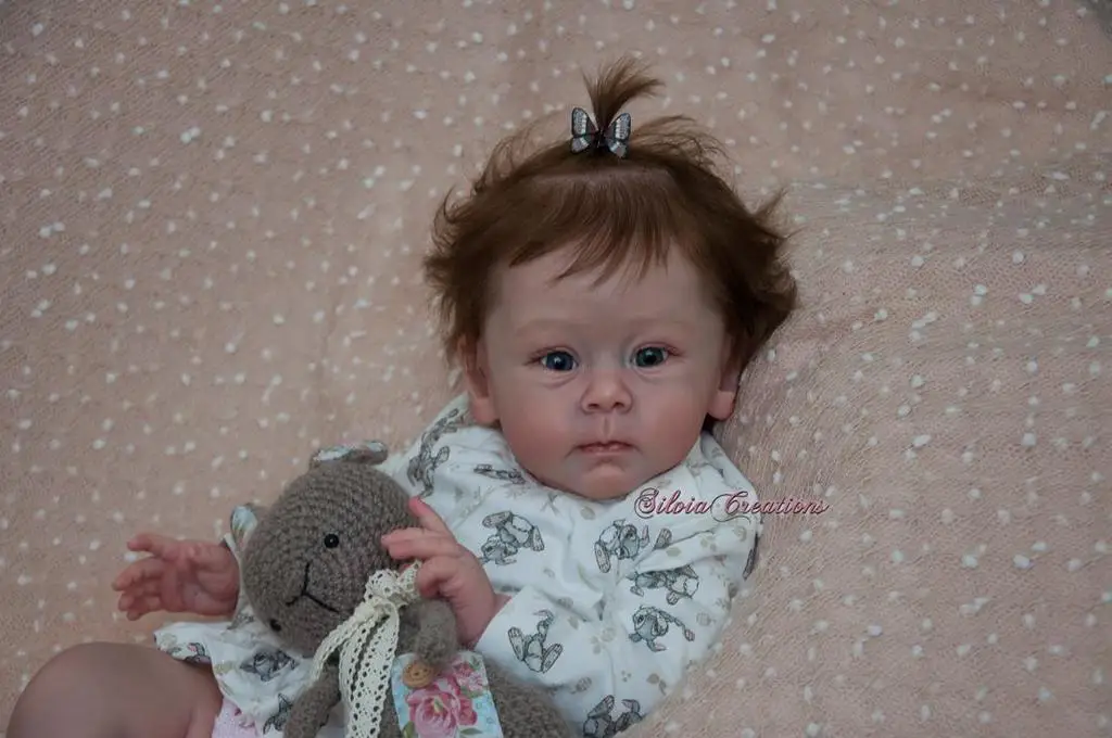 Виниловая кукла новорожденный Huxley Reborn 23 дюйма