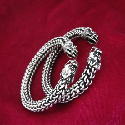 

Ethnic wind Miao silver handmade Miao silver bracelet men and women twisted wire head bracelet