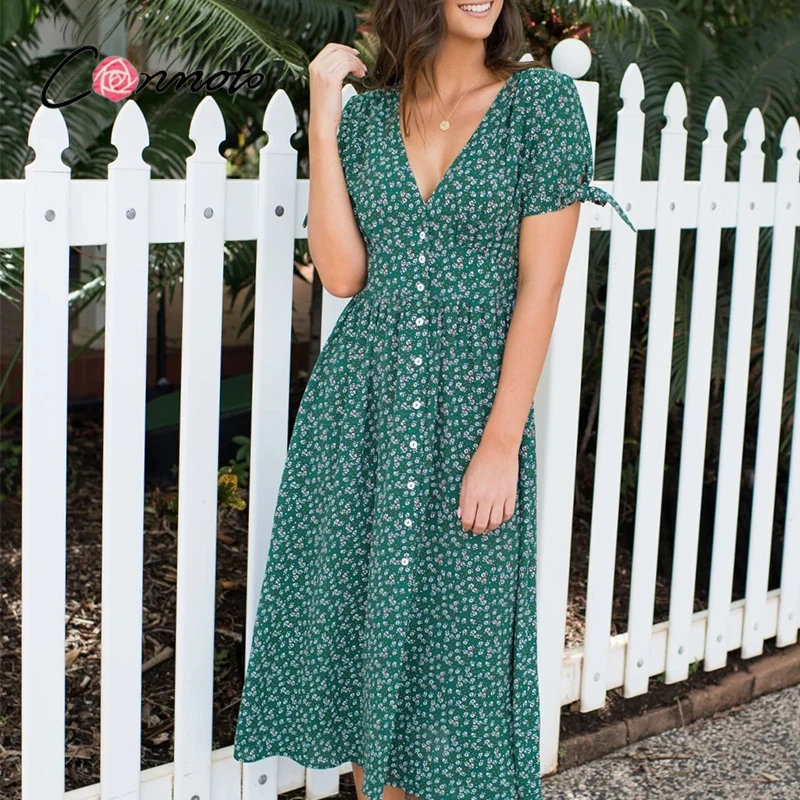 

Conmoto Holiday floral puff short-sleeved summer dress Boho pleated lace up sun dress V-neck button up ladies vestidos 2021