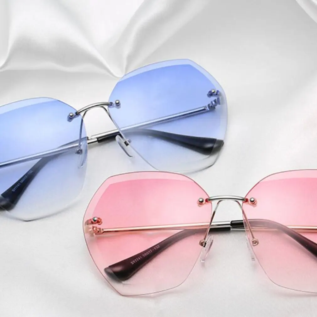 

European And American Fashion Rimless Sunglasses UV400 Ladies Comfortable Metal Glasses High Definition Lens