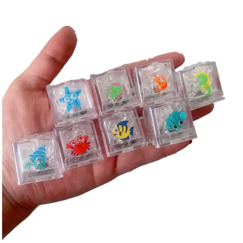 

Drop Ship. Glowing Sea Animal Ice Cubes Baby Bath Toy Playing Water Pool Diving Game