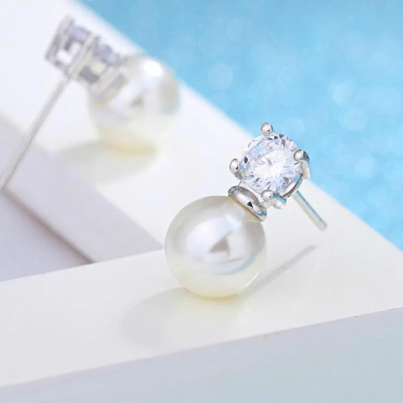 Серьги-гвоздики женские серебряного цвета с жемчугом и цирконом - купить по