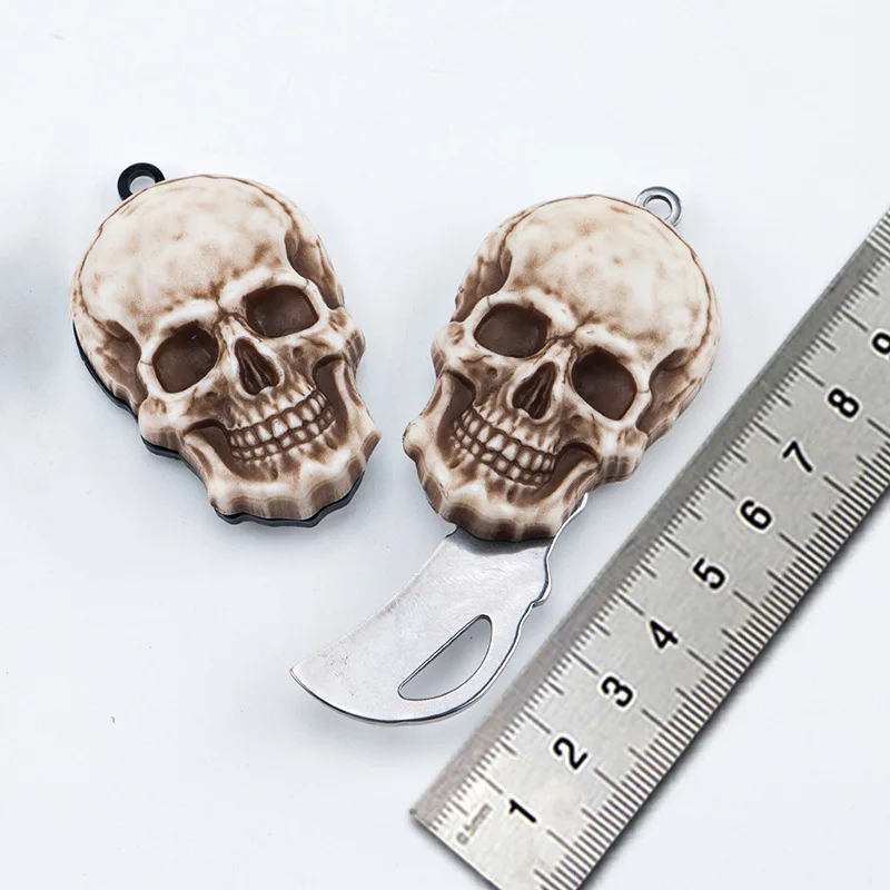 

Skull Head Mini Pendant Stainless Steel Express Knife Necklace Pendant Outdoor Survival Pocket Knife Folding Fruit Knife