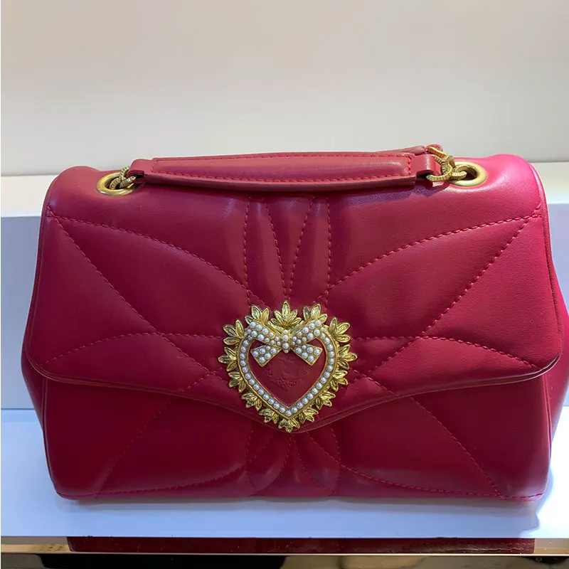 

High quality genuine leather cowhide luxury golden heart handbag ladies 2021 new shoulder bag messenger bag