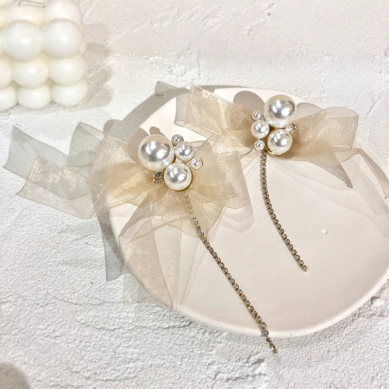 

Origin Summer Vintage Perspective Bowknot Earrings for Women Oversize Imitation Pearl Tie Bow Dangle Earrings Vintage Jewelry