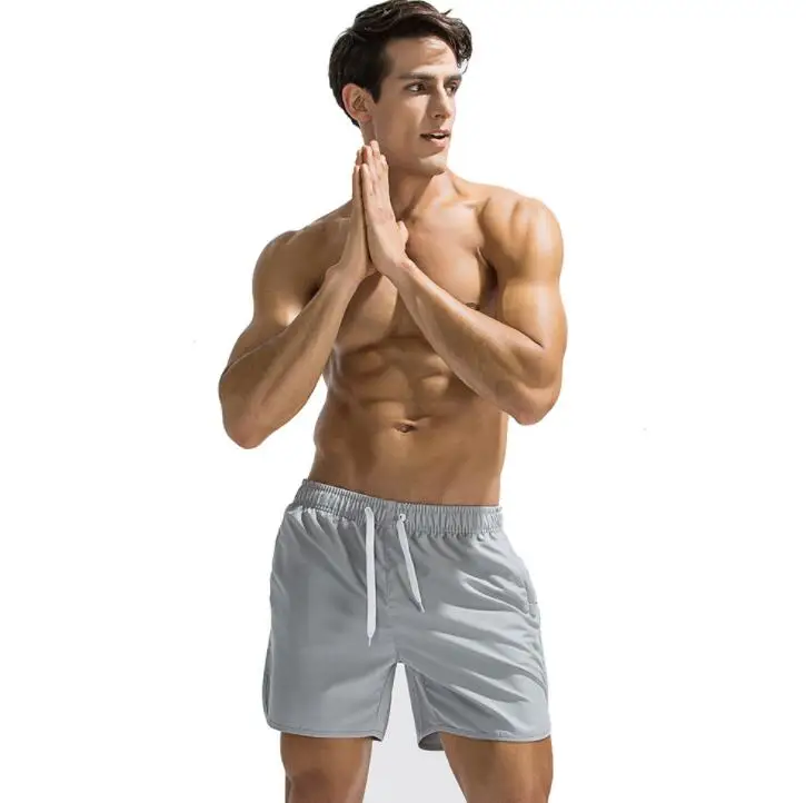 Solid color straight loose beach pants with slit pockets sports style five-point shorts short pants