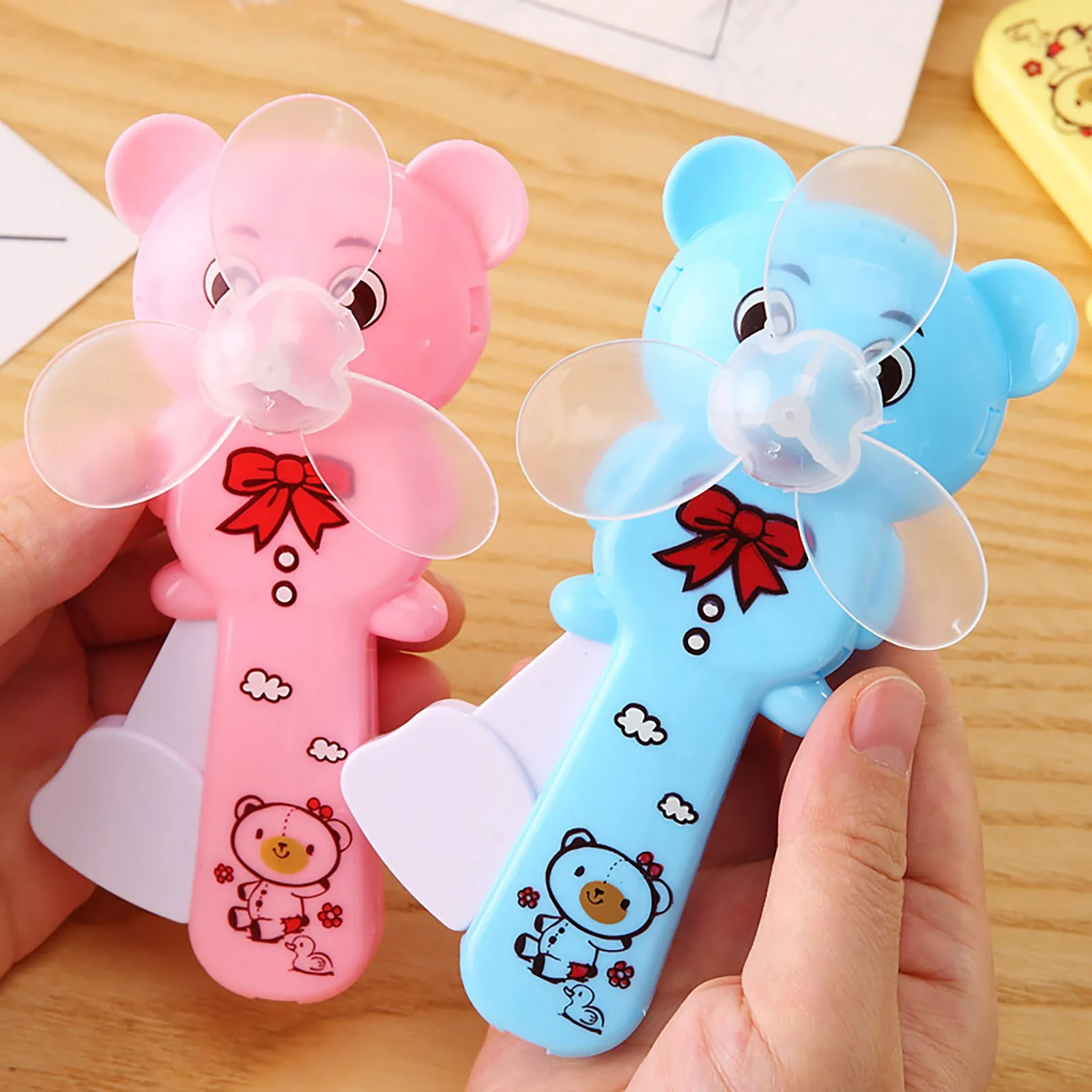 

Summer mini portable bear hand pressure fan handheld cooling fan handheld mini portable fan USB charging
