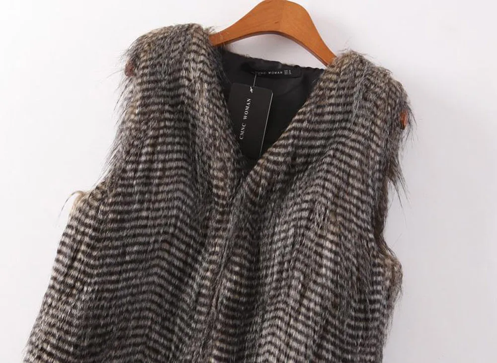 Женский зимний жилет из искусственного меха безрукавка с павлиньим мехом D90809 2019 |