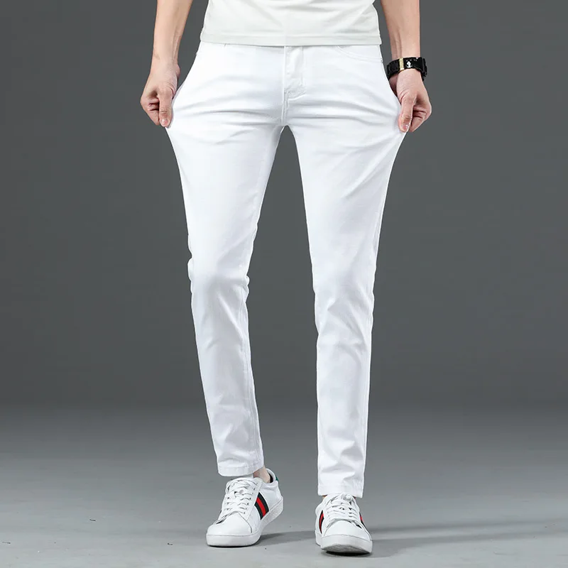 

2021 new pure white young and middle-aged men's Korean fashion casual jeans pants men