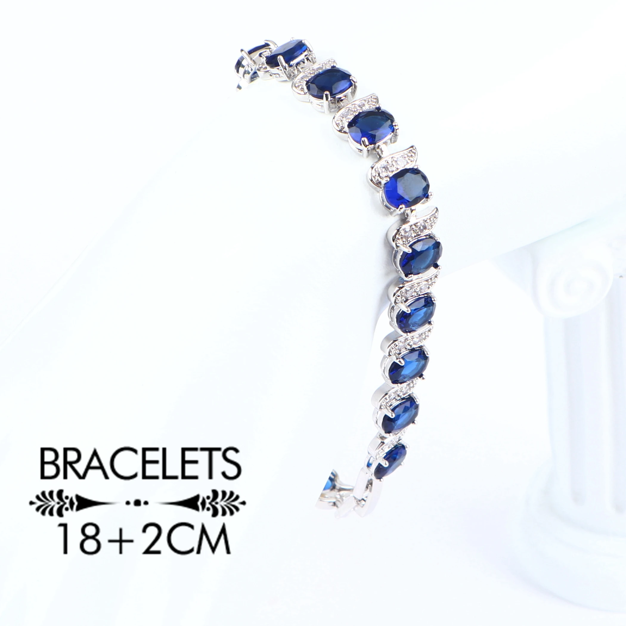 Набор свадебных украшений из серебра 925 пробы с голубым цирконием женский костюм