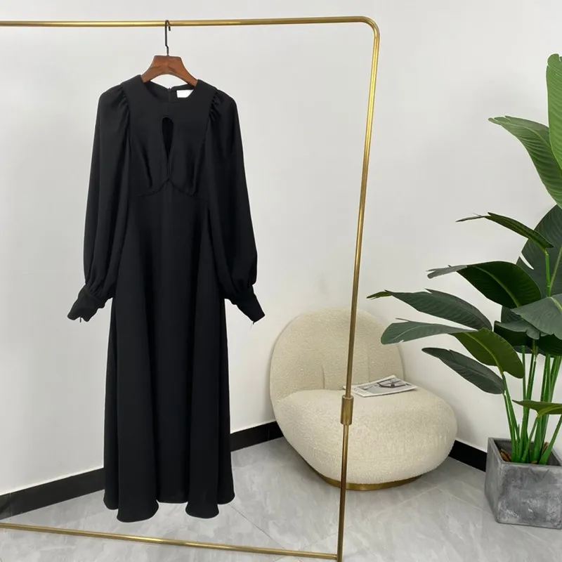 

Wholesale Items 2021 Autumn Hot Sale Front Raindrop Hole Cut Out Lantern Sleeve Women Elegant White Black Midi Dresses