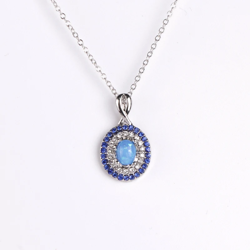 Женское ожерелье с подвеской винтажное большим круглым диском имитацией синего