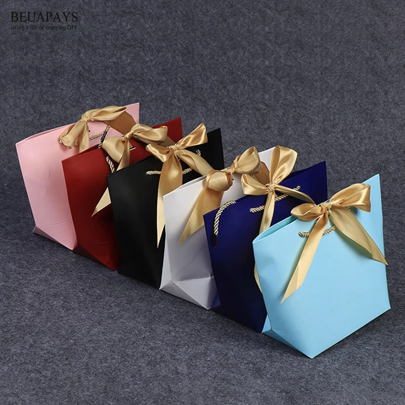 

50pcs candy box Special Paper Bag Customized Baby shower wedding decoration Birthday Christmas Gift Ship-type Clothing Bag Spot