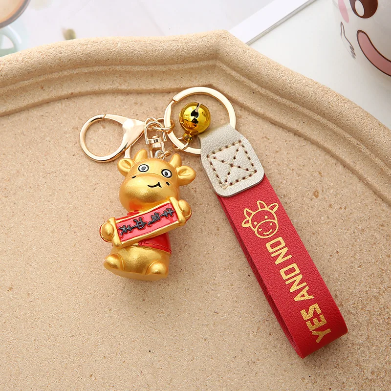 

Fashion Of The Ox Taurus Key Chain Bag Accessories Chinese Zodiac Calf Doll Couple Gift Pendant Car KeyChain Customized Couplets