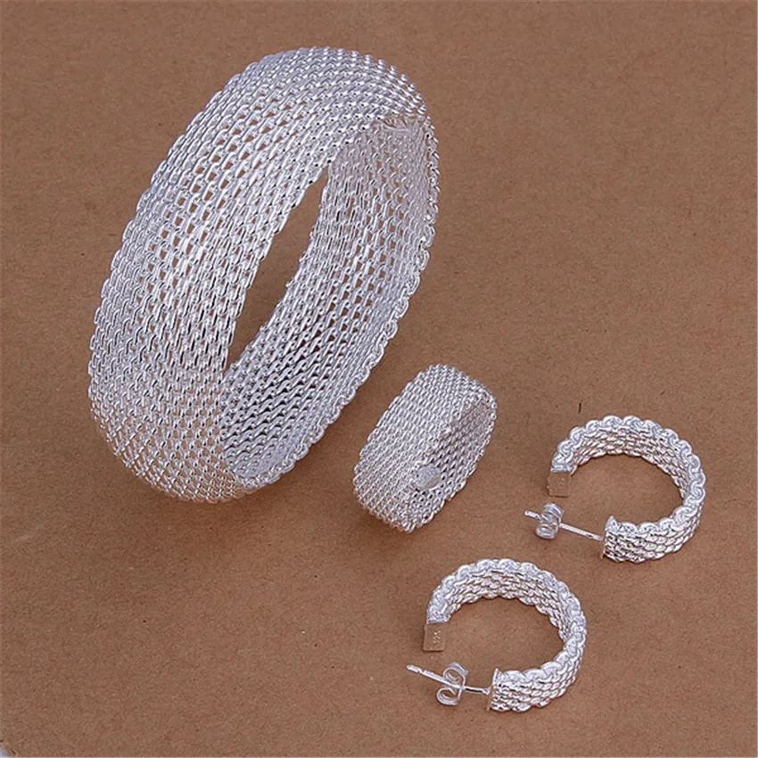 

Комплект из кольца и серёг, из серебра 925 пробы