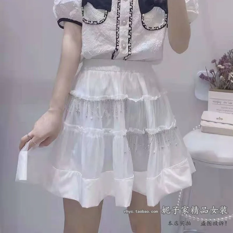 

2021 Summer New Sweet Beads Tassel Short Skirt Faldas Mujer Elastic Waist Miniskirt Divided Skirt A-line Casual Women's Skirt