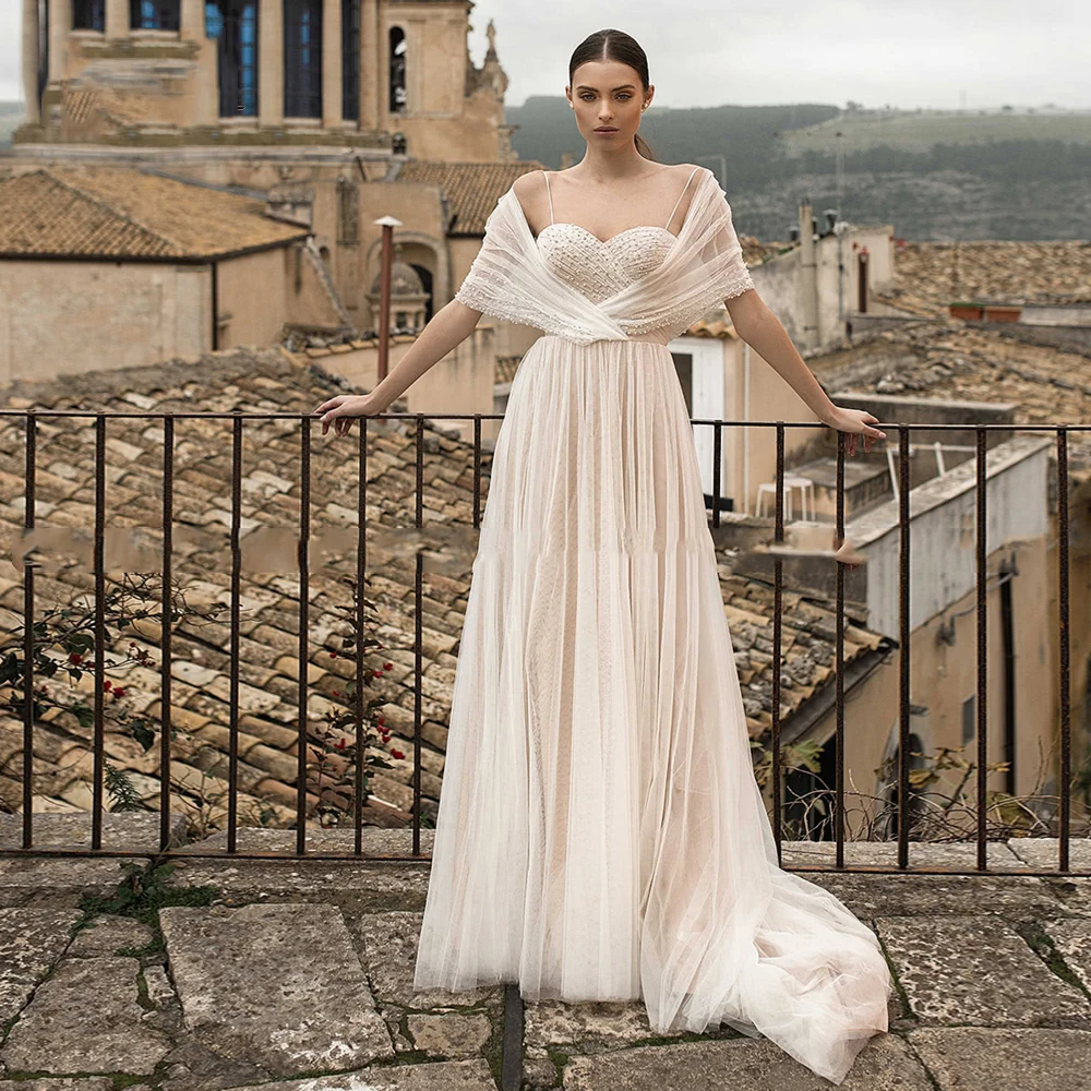 

Charming Spaghetti Straps Wedding Dress Sweetheart Sleeveless Zipper Back Pearls Sweep Train Bridal Gowns 2021 Vestido De Noiva