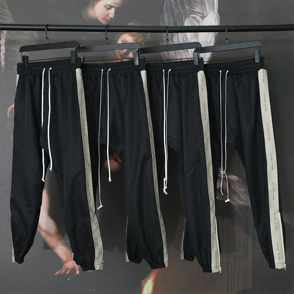 

Женские и мужские спортивные брюки на молнии, с Кулиской