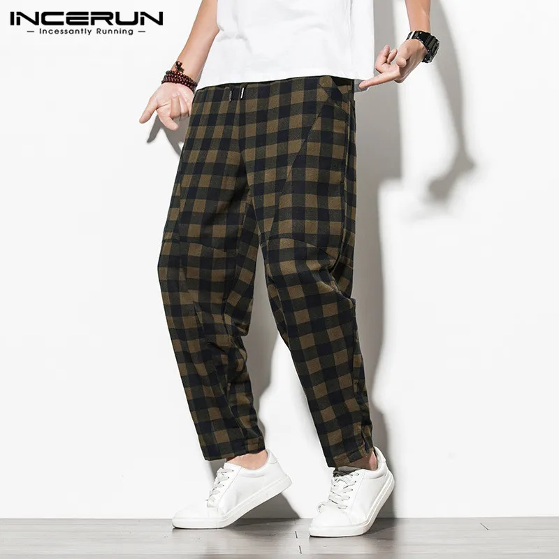 

Men Loose Drop Crotch Trousers INCERUN Fashion Plaid Harem Pants Leisure Drawstring Multi Pockets Casual Pants Streetwear 5XL 7