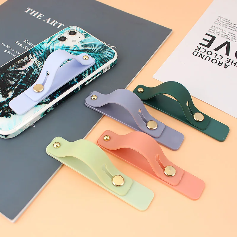 

Plain color Wrist band hand band finger grip mobile phone holder stand push pull universal phone socket holder for iphone Xiaomi