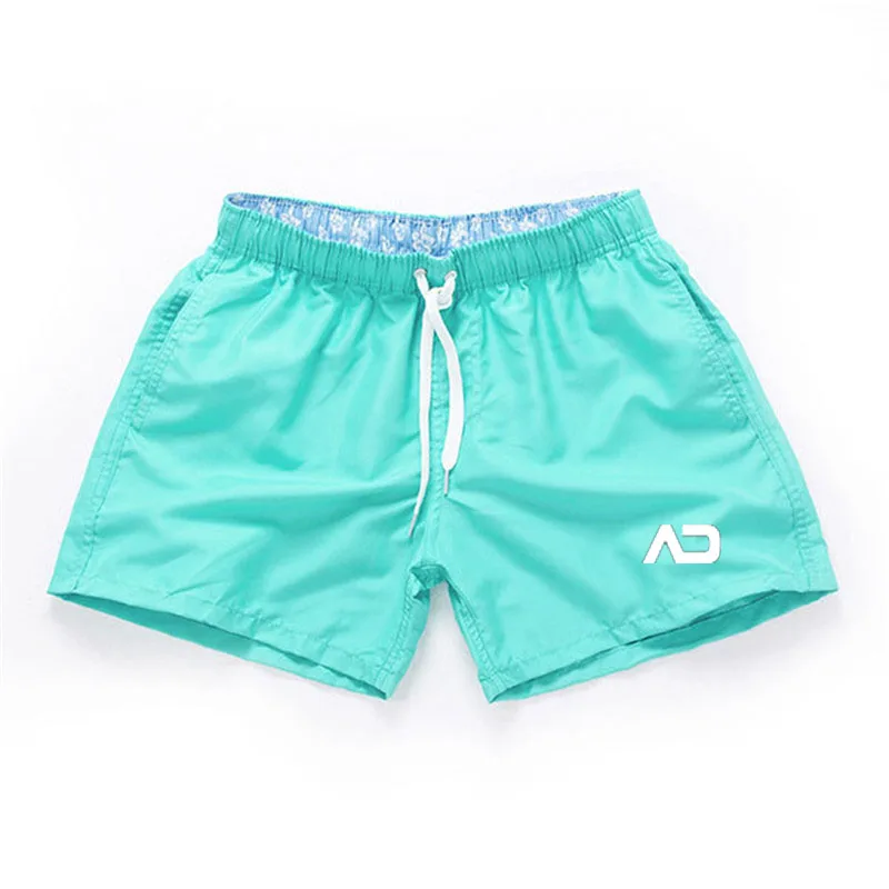 Мужские пляжные шорты с заниженной талией зеленые однотонные дышащие плавки