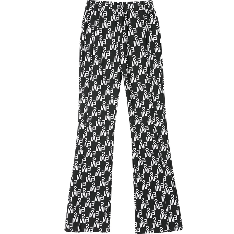 

Elegant black monogram print with high-waisted pockets and wide-leg trousers. Flared trousers