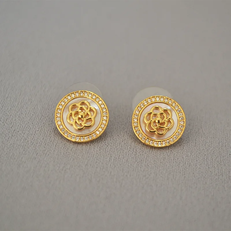 

South Korea Dongdaemun brass micro-inlaid zircon flash camellia simple temperament 925 silver needle stud earrings