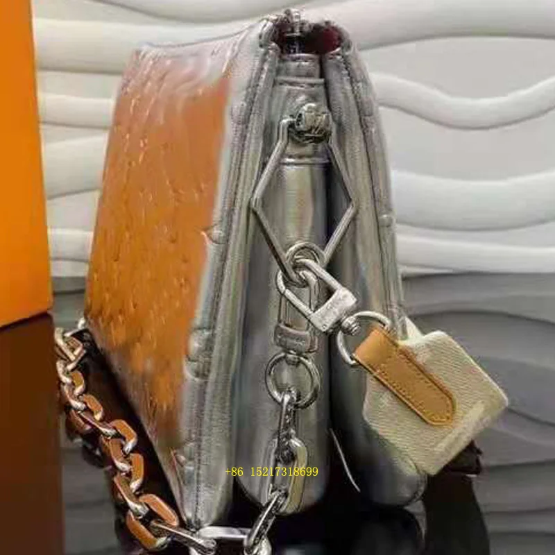 

Spring and summer high quality leather brand single shoulder slanting armpit pillow bag chain method stick bag leisure bag