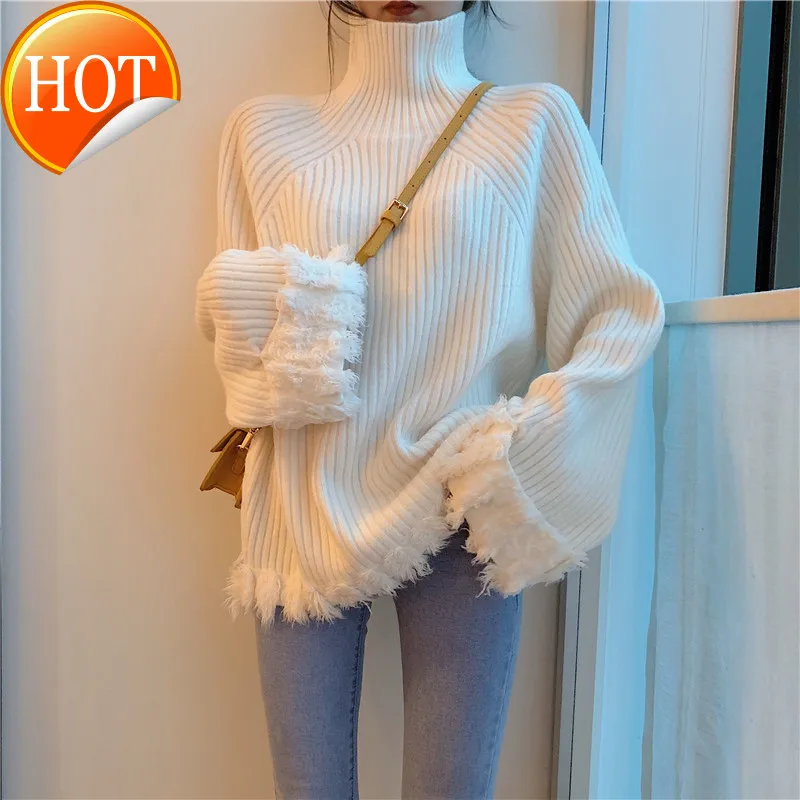 

South Korea Gate net red high collar age reduction lazy loose thick high neck splicing tassel sweater