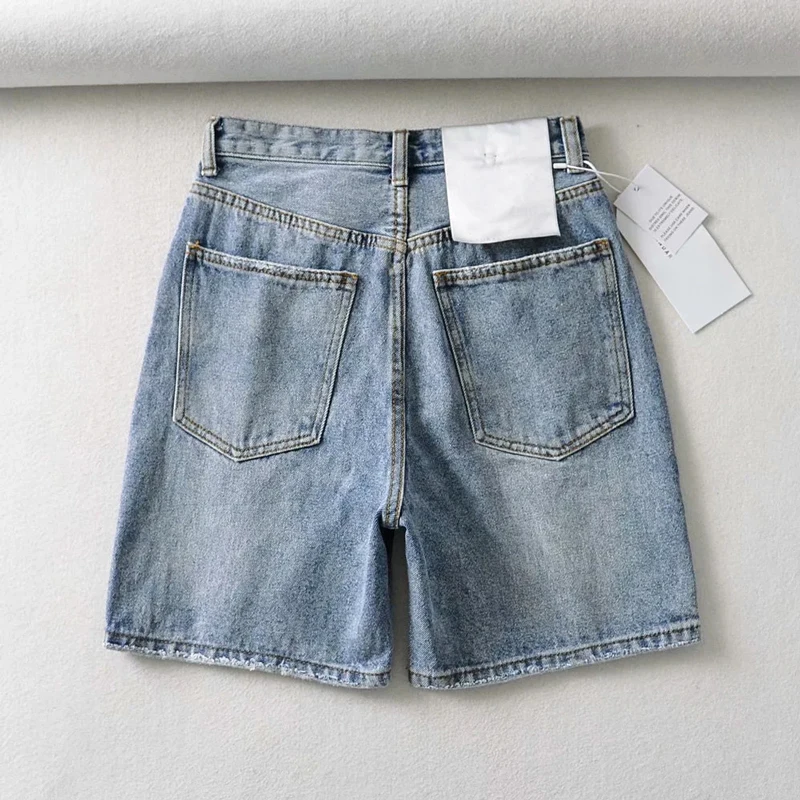 

Women Skew off-center fly Longline Denim Jeans Asymmetric Fly Jeans Shorts With Button Closue
