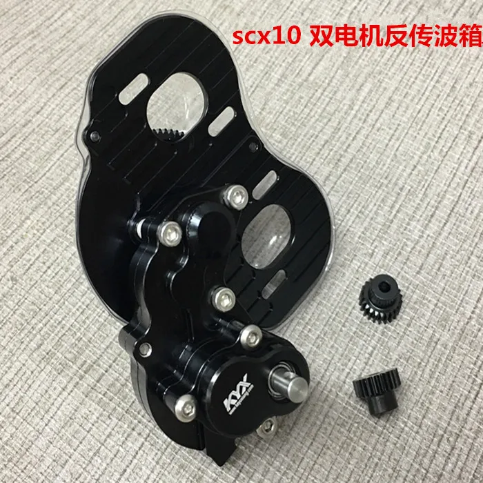 KYX Racing Metal Reverse Dual Motor Transmission Gearbox Upgrades Parts Accessories for 1/10 RC Crawler Car Axial SCX10 on переводится на русский язык следующим образом: Коробка передач KYX Racing из металла с обратной двойной моторной передачей, деталями