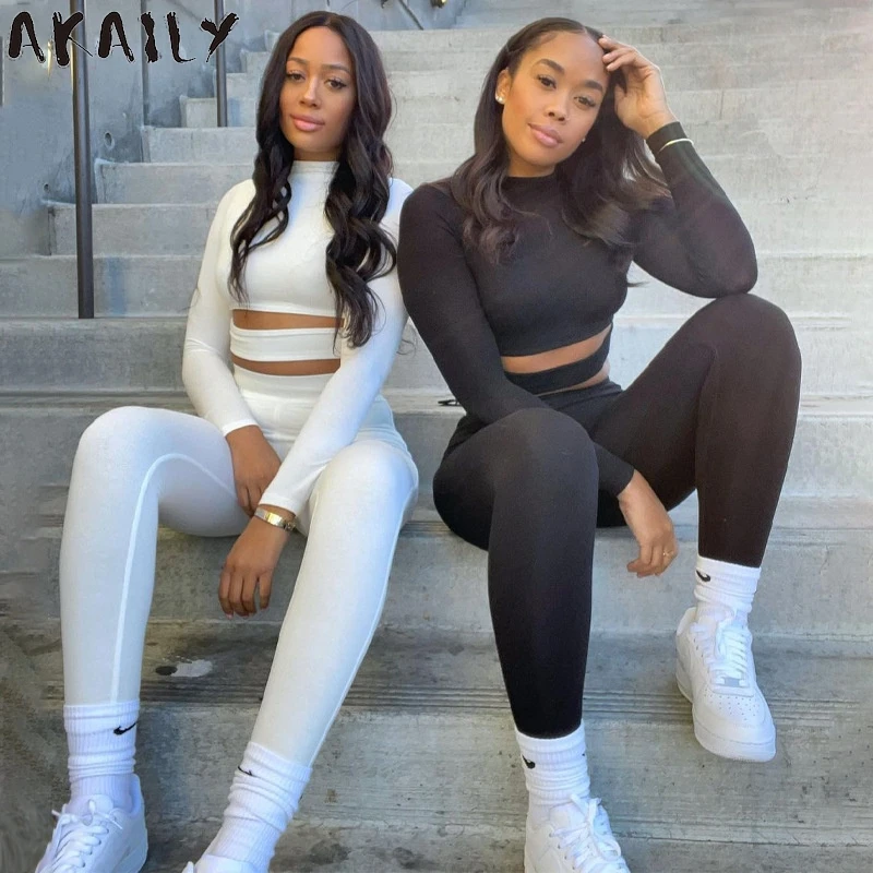 

Akaily Autumn Streetwear Solid 2 Two Piece Sets Tracksuit Women Fitness Outfits 2021 White Hollow Out Crop Top Long Pants Sets