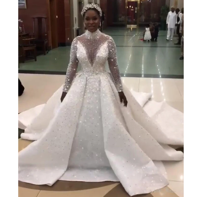 

Роскошные арабские Дубаи трапециевидные атласные свадебные платья с высоким воротником с длинным рукавом кристаллы для церкви свадебное п...