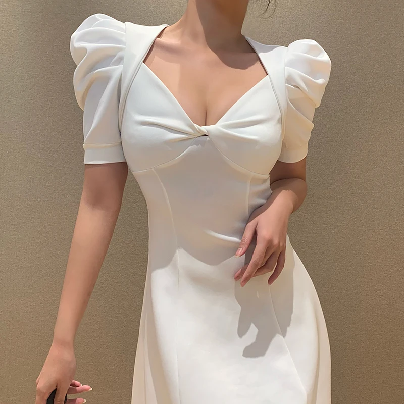 

V-neck kink retro dress women's European and American fashion bubble sleeve slim pleated white skirt