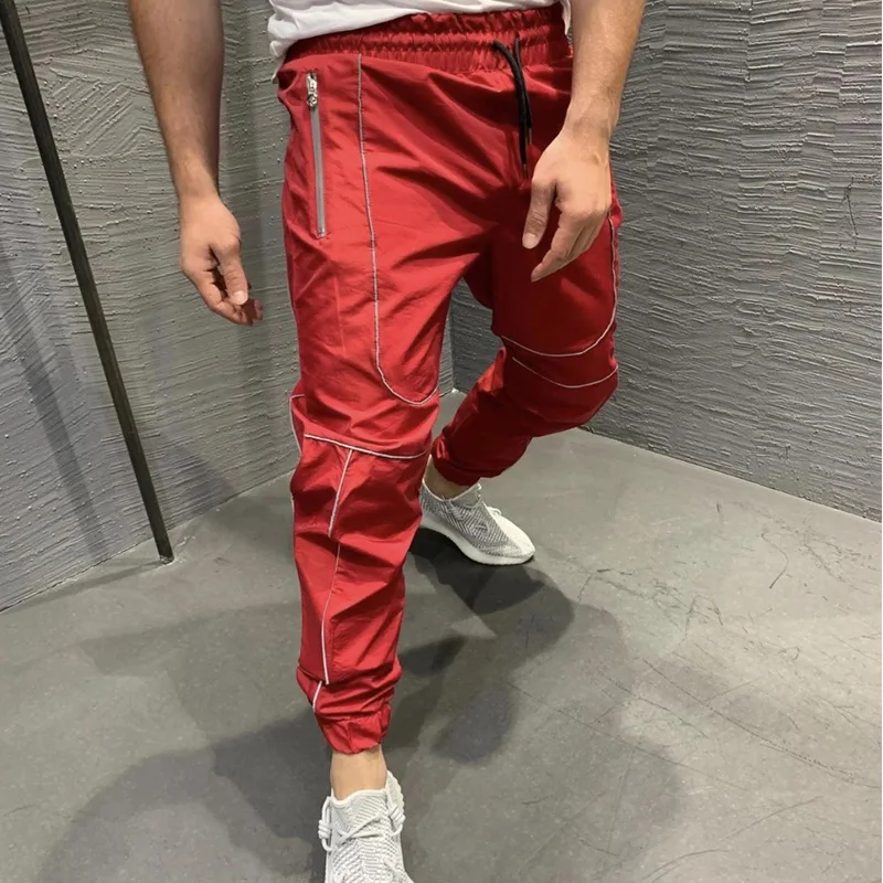 Мужские светящиеся штаны для спортзала тренировочные на молнии с карманами