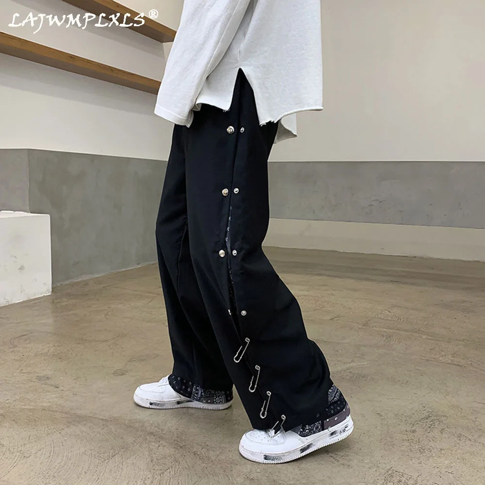 

Couple Pants Trendy Cashew Flower Stitch Casual Ins Harajuku High Street Hip-hop Button Pendant Niche Wide-leg Trousers Men