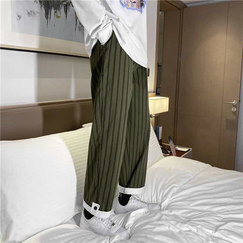 

Полосатые повседневные мужские прямые брюки 9/10