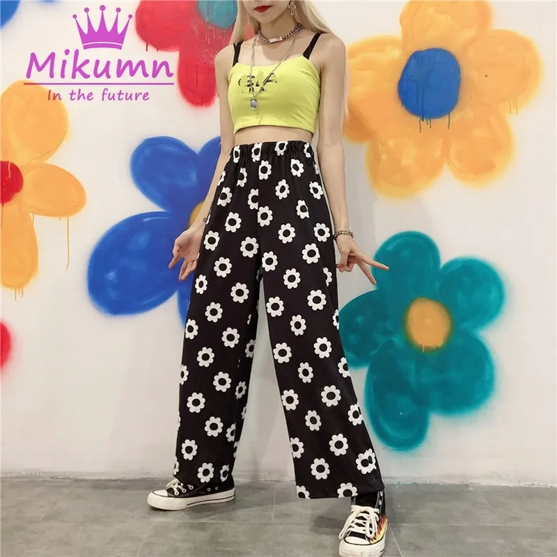 Женские свободные брюки с цветочным принтом оранжевые черные синие прямые