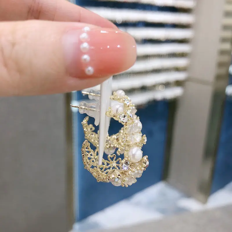 

The new 925 Silver Flower Pearl Earring 2021 senior sense temperament earrings earring