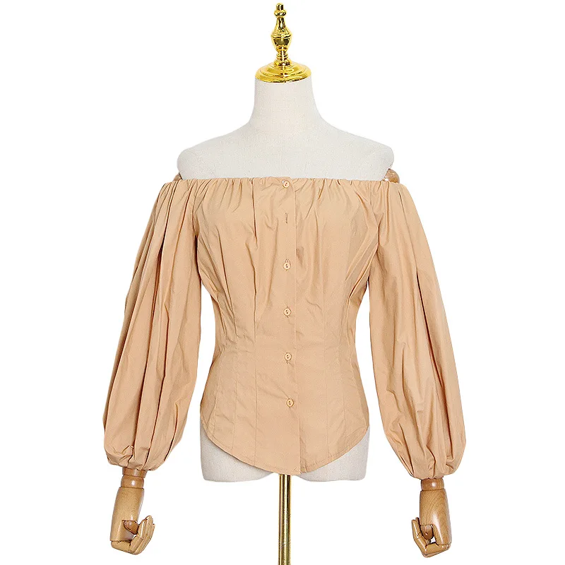 

French niche new fashion temperament slim lantern sleeve collar shoulder leakage solid color breasted shirt