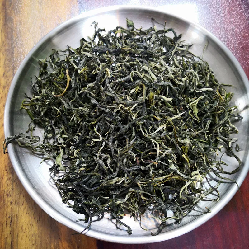 Зеленый китайский чай с зернистой текстурой весна осень высокая гора зеленый