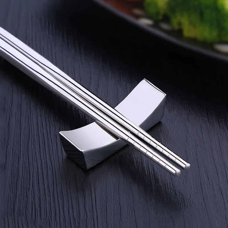 

Stekelstokjes van roestvrij staal houder chopsticks kussen hotel restaurant van het opzetten van creatieve huishoudelijke tafelg
