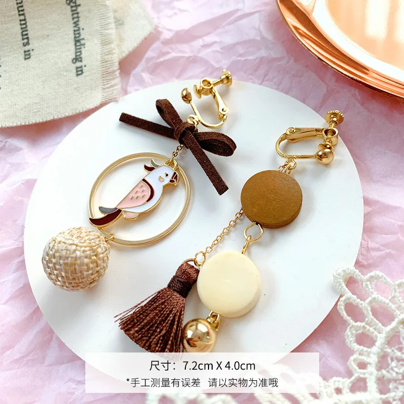 Японский бант птица дерево кисточка ассиметричная длинная без пирсинга клипсы