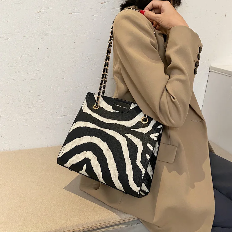

Hot Sale European and American Fashion PU Leather Printed Zebra Shoulder Bag Versatile Women Purse And Handbag