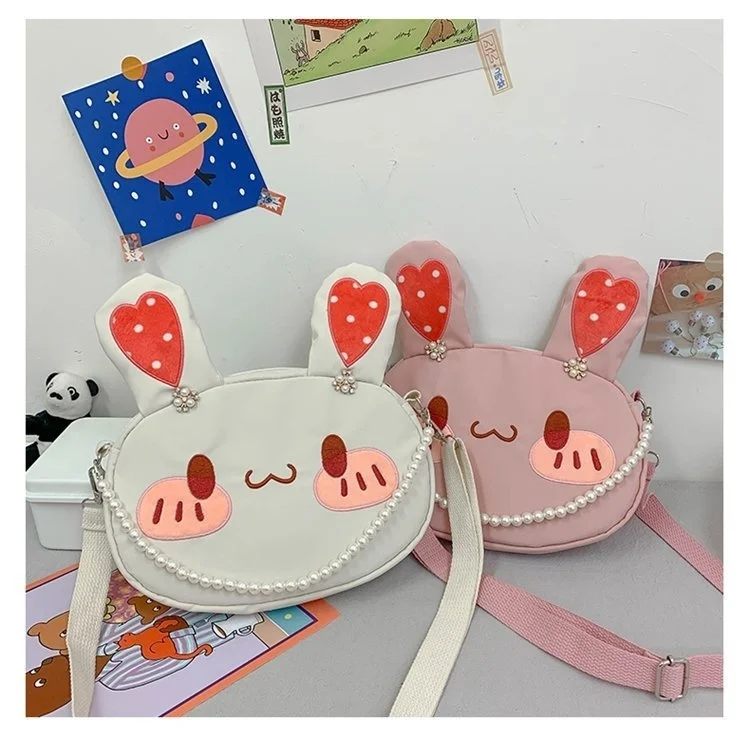 

Animation surrounding cute soft cute rabbit pearl chain soft girl student messenger bag funny personality bag